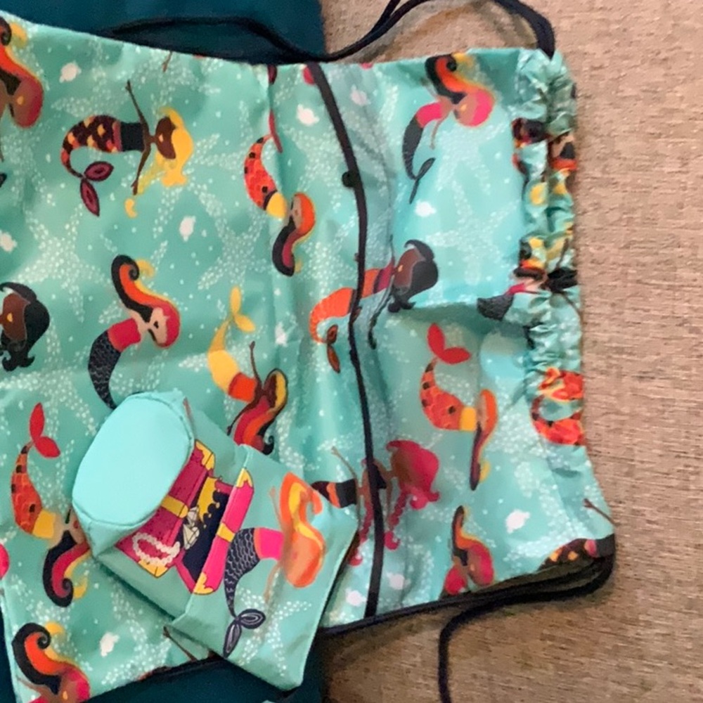 Mermaid print cinch sack with matching zipper pouch.